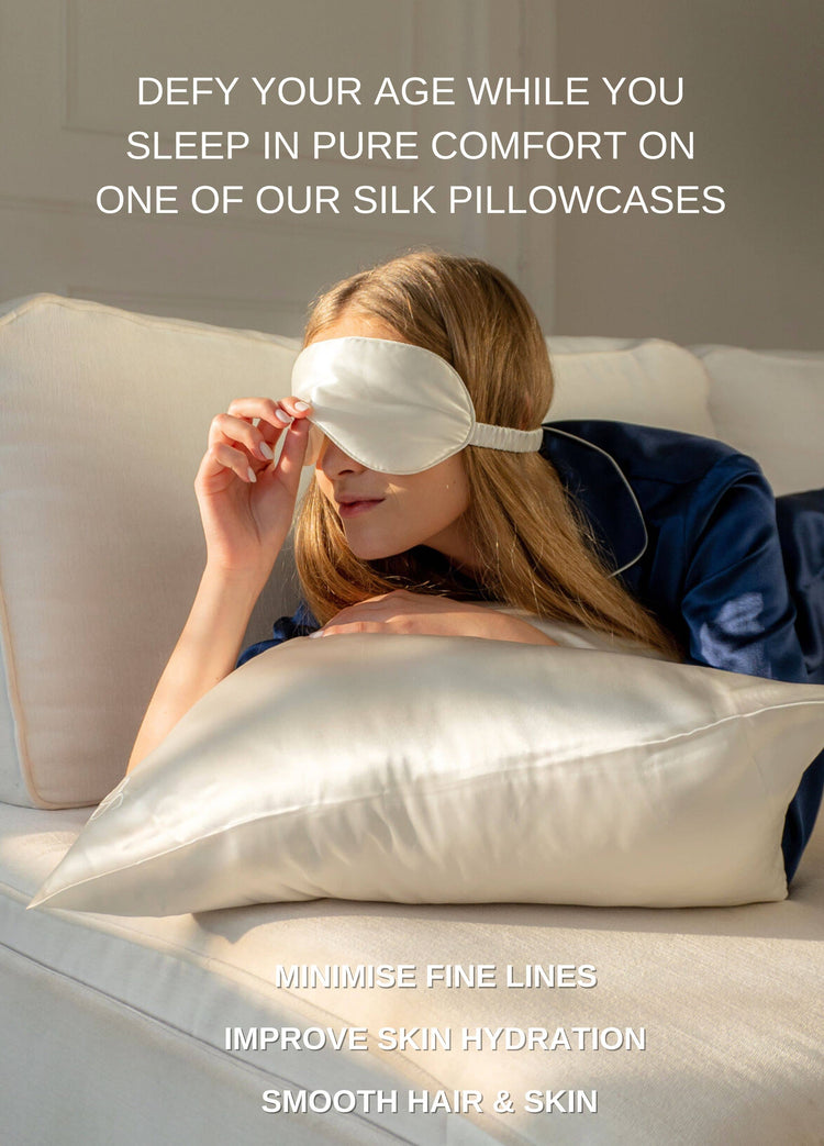 Woman sleeping on a silk pillowcase by Silk Closet wearing an eye mask and silk pajamas