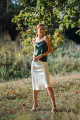 Silk Closet ivory silk midi slip skirt with green camisole top.