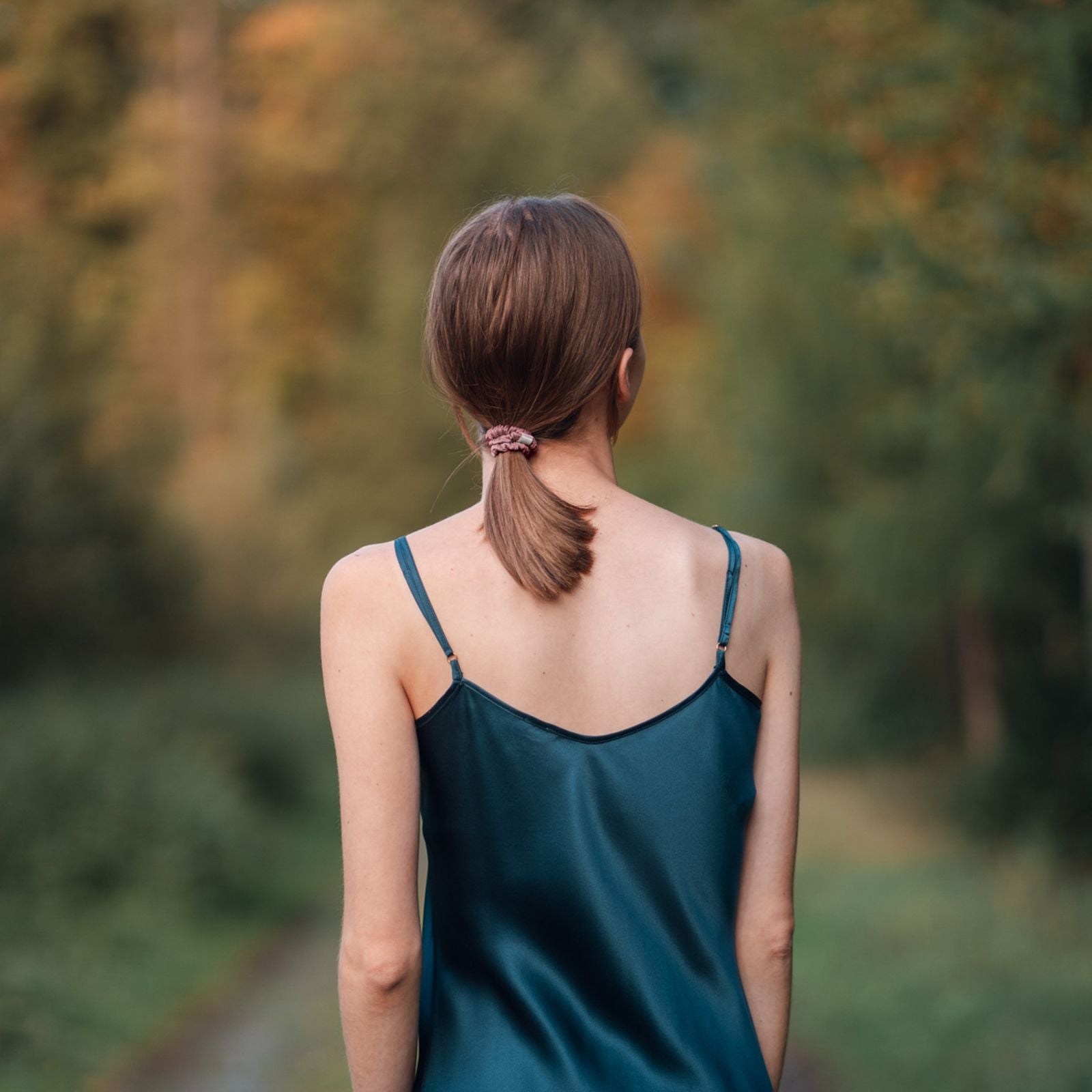 Woman wearing Silk Closet rose scrunchie