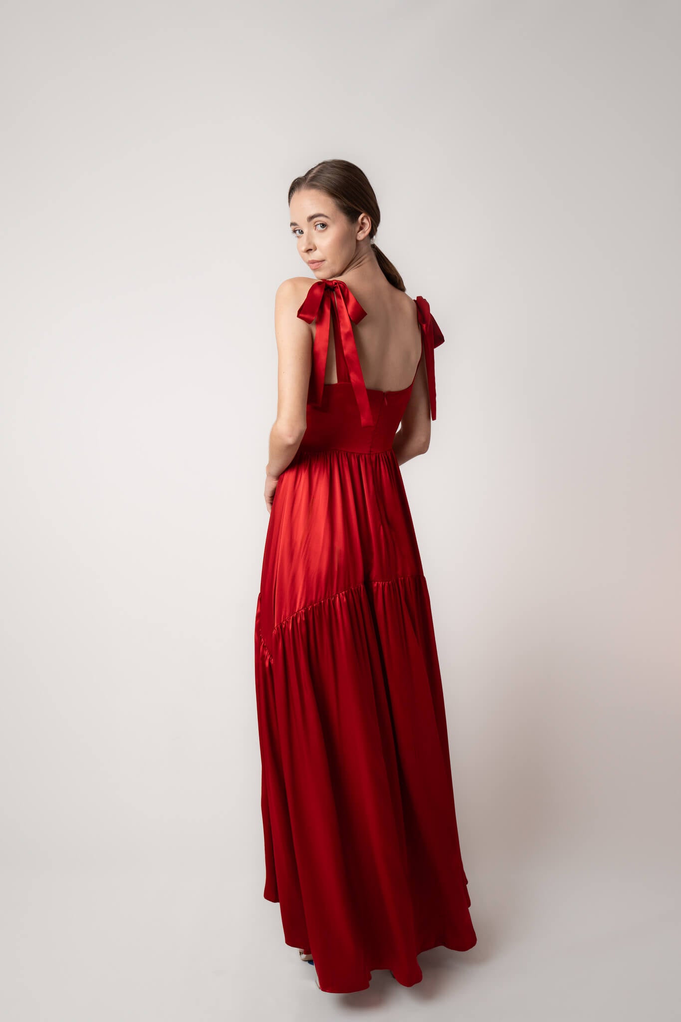 Beautiful red silk maxi dress with tiers and bows full length back view